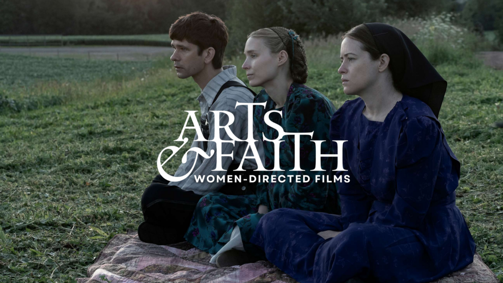 Image of #1 film on the list - Women Talking. Shows three people sitting on a blanket outside. 